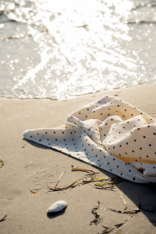 Handtuch dots am Strand
